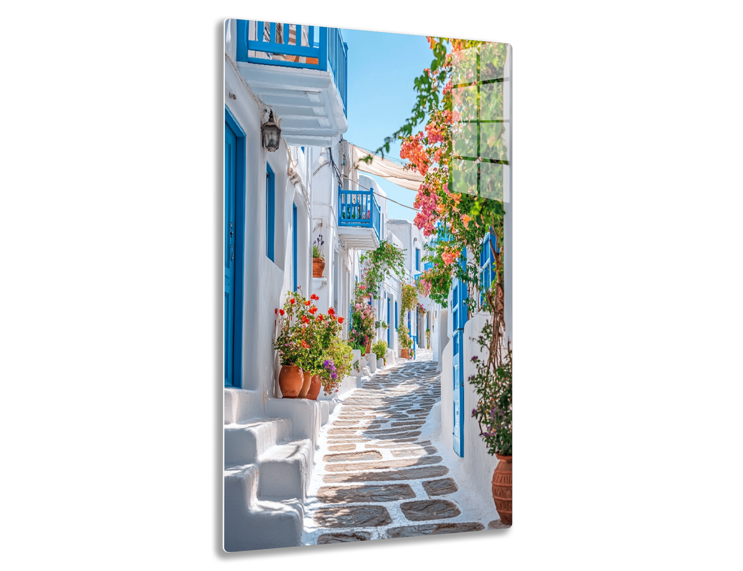 A picturesque alleyway in a traditional Greek village, featuring white-washed buildings with blue doors and windows, adorned with vibrant bougainvillea flowers and potted plants, and a cobblestone path leading through the