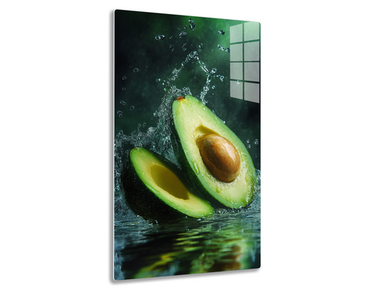 An avocado splashing into water, creating a crown of water droplets surrounding its sliced open flesh revealing the bright green meat and large brown pit inside.
