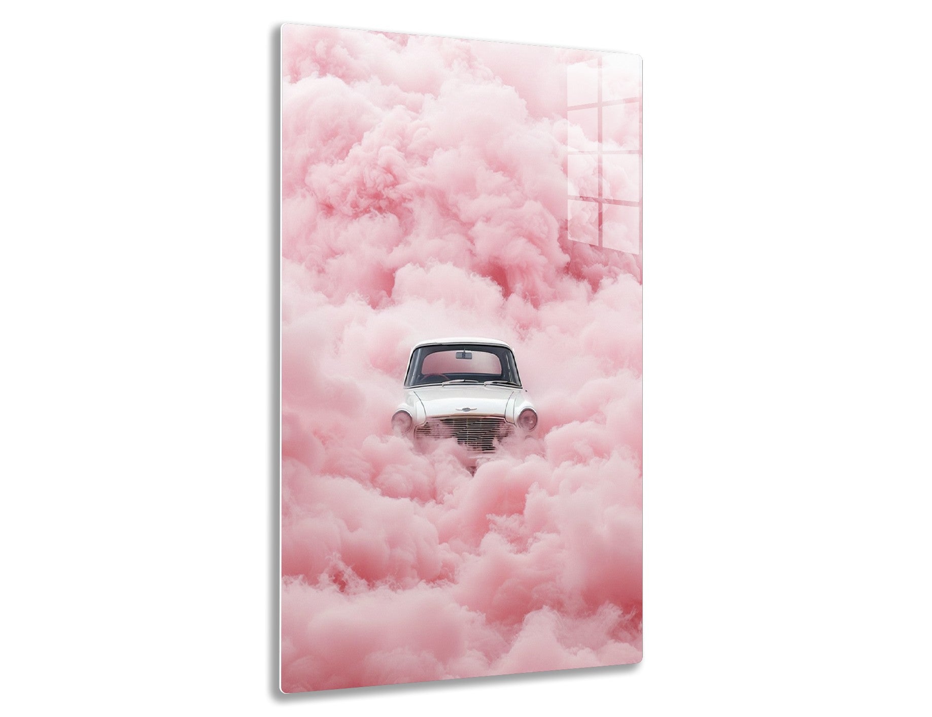 A vintage white car suspended amidst billowing pink clouds, creating a whimsical and surreal atmosphere.
