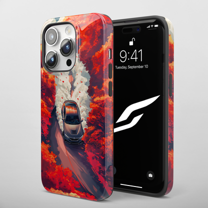 Autumn Drive (iPhone Case 11-15)Elevate your iPhone's protection and style with RimaGallery's A car journey through a fiery autumnal forest On case, featuring dual-layer defense and a sleek, glossyRimaGallery
