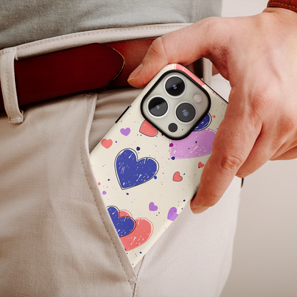 Whimsical Hearts (iPhone Case 11-15)Shop RIMA Tough Phone Case for iPhone 11-15: Ultimate protection with double-layer defense, glossy finish, and wireless charging compatibility. Urban and weather-resRimaGallery