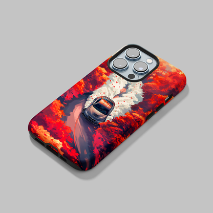 Autumn Drive (iPhone MagSafe Case)Elevate your iPhone's protection and style with RimaGallery's A car journey through a fiery autumnal forest on iphone MagSafe Case against a dark backdrop. Enjoy duaRimaGallery