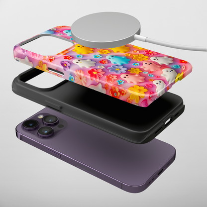 Ghoulish Garden (iPhone MagSafe Case)Elevate your iPhone's protection and style with RimaGallery's Playful ghost characters amidst a floral backdrop on a bright MagSafe Case against a dark backdrop. EnjRimaGallery