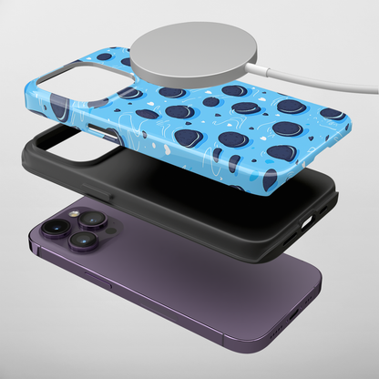 Sweet Whirls (iPhone MagSafe Case)Elevate your iPhone's protection and style with RimaGallery's Cookie pattern with heart accents on a blue iphone MagSafe Case against a dark backdrop. Enjoy dual-layRimaGallery