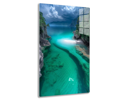 Breathtaking turquoise lake surrounded by towering mountains and rocky cliffs, with a small sandy beach in the foreground under stormy skies.
