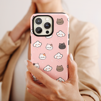 Purrfect Skies (iPhone Case 11-15)Shop RIMA Tough Phone Case for iPhone 11-15: Ultimate protection with double-layer defense, glossy finish, and wireless charging compatibility. Urban and weather-resRimaGallery