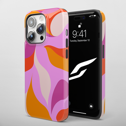 Peachy Swirls (iPhone MagSafe Case)Elevate your iPhone's protection and style with RimaGallery's Peachy Swirls design in sunset shades on a MagSafe Case against a dark backdrop. Enjoy dual-layer defenRimaGallery