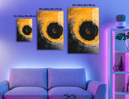 A close-up of a muddy tire tread, with vibrant orange and black splatters creating an abstract spiral pattern.
