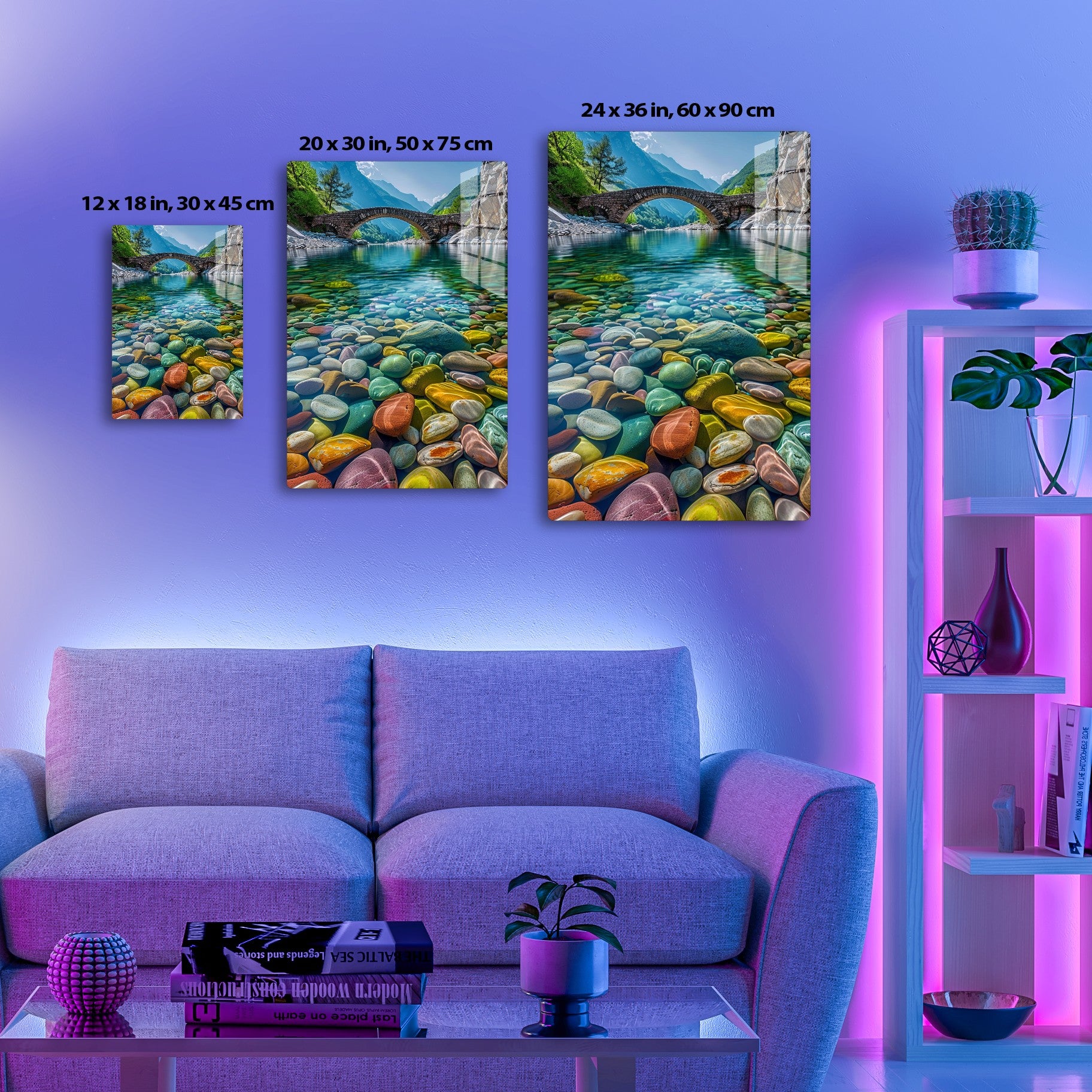 Breathtaking view of a stone bridge arching over a crystal-clear river, framed by towering mountains and lush greenery, with vibrant, colorful pebbles adorning the river bed.
