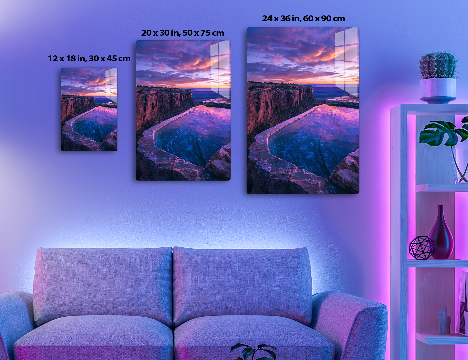 Stunning sunset over rocky coastline with vibrant purple and orange clouds reflecting in a curved tide pool along the clifftop path.
