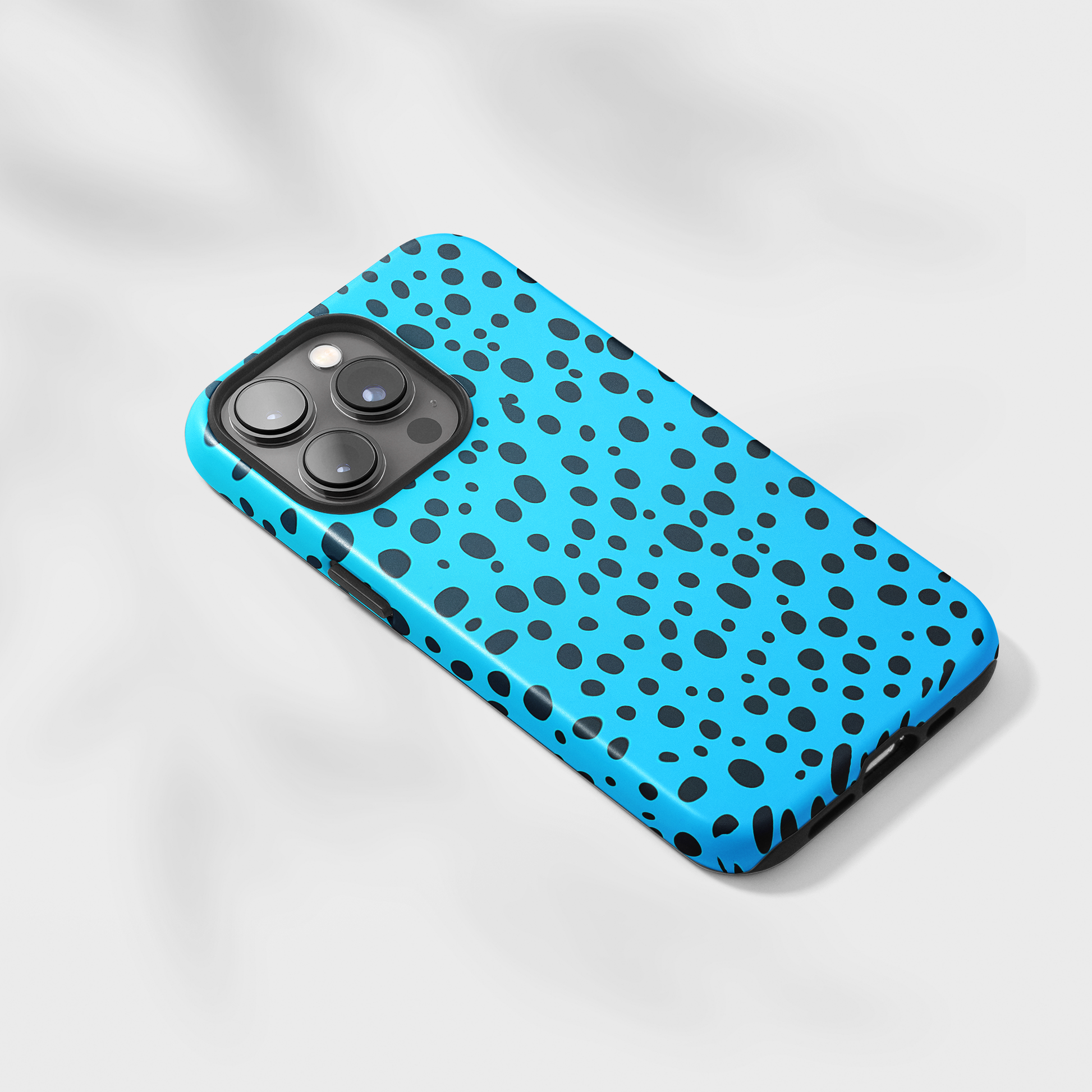 Dotted Delight - Sky Blue (iPhone Case 11-15)Elevate your iPhone's style with a Sky Blue surface with scattered dark dots and a tough case. Sleek, durable protection for models 11-15. Free US shipping.RimaGallery