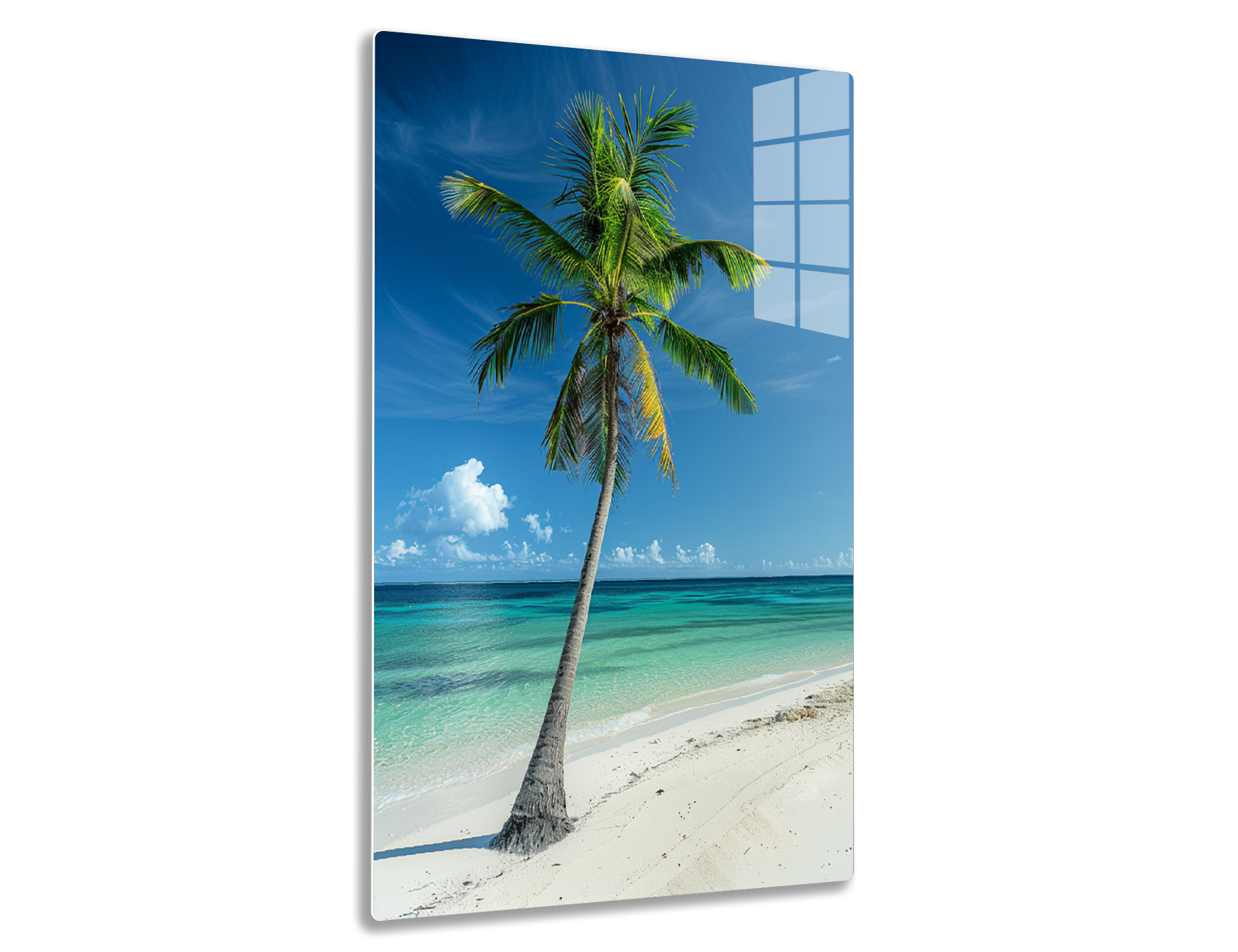 A tall palm tree stands on a pristine sandy beach against a vibrant blue sky with white clouds overlooking turquoise waters of the ocean, creating a picturesque tropical paradise scene.
