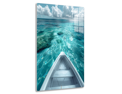 Crystal clear turquoise waters with rippling patterns from a boat's bow view, surrounded by cloudy blue skies creating a serene tropical paradise.
