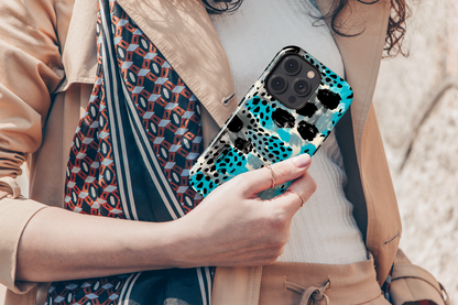 Teal Spots (iPhone Case 11-15)Elevate your iPhone's protection and style with RimaGallery's Trendy animal print pattern with teal accents On case, featuring dual-layer defense and a sleek, glossyRimaGallery