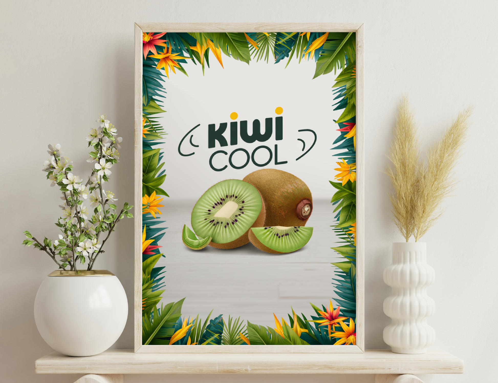 Tropical frame with kiwi slices and "Kiwi Cool" text, showcasing the fruit against vibrant leaves and flowers.

