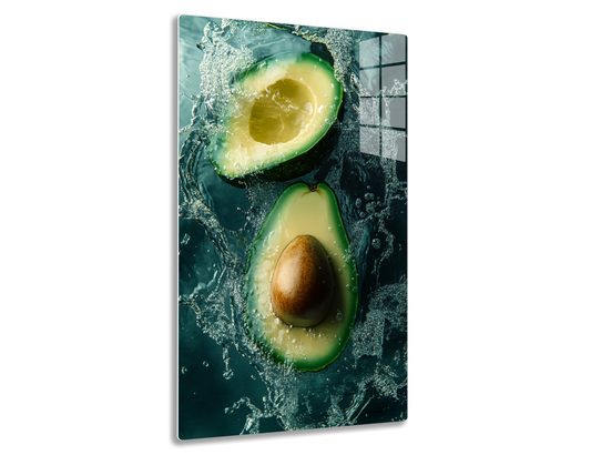 Fresh avocados submerged in water with splashing bubbles creating an artistic underwater composition.
