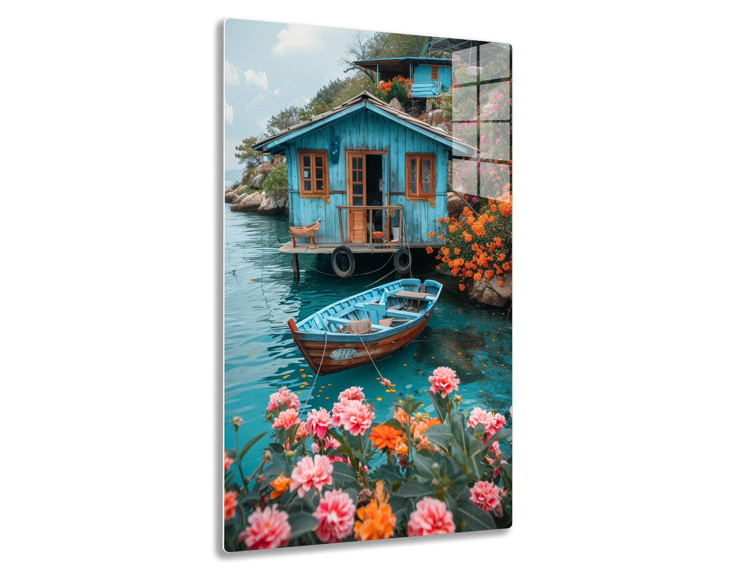 A colorful floating house with a turquoise wooden exterior and lush flowers on the water's edge, accompanied by a small wooden boat in a picturesque natural setting.
