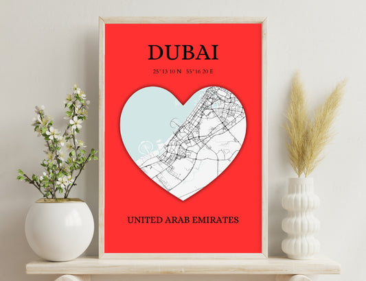 Heart-shaped map of Dubai, UAE with city streets outlined against a red background, showcasing Dubai's location coordinates and identifying it as part of the United Arab Emirates.
