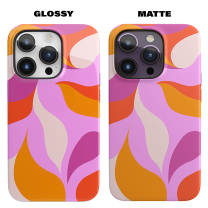 Peachy Swirls (iPhone MagSafe Case)Elevate your iPhone's protection and style with RimaGallery's Peachy Swirls design in sunset shades on a MagSafe Case against a dark backdrop. Enjoy dual-layer defenRimaGallery