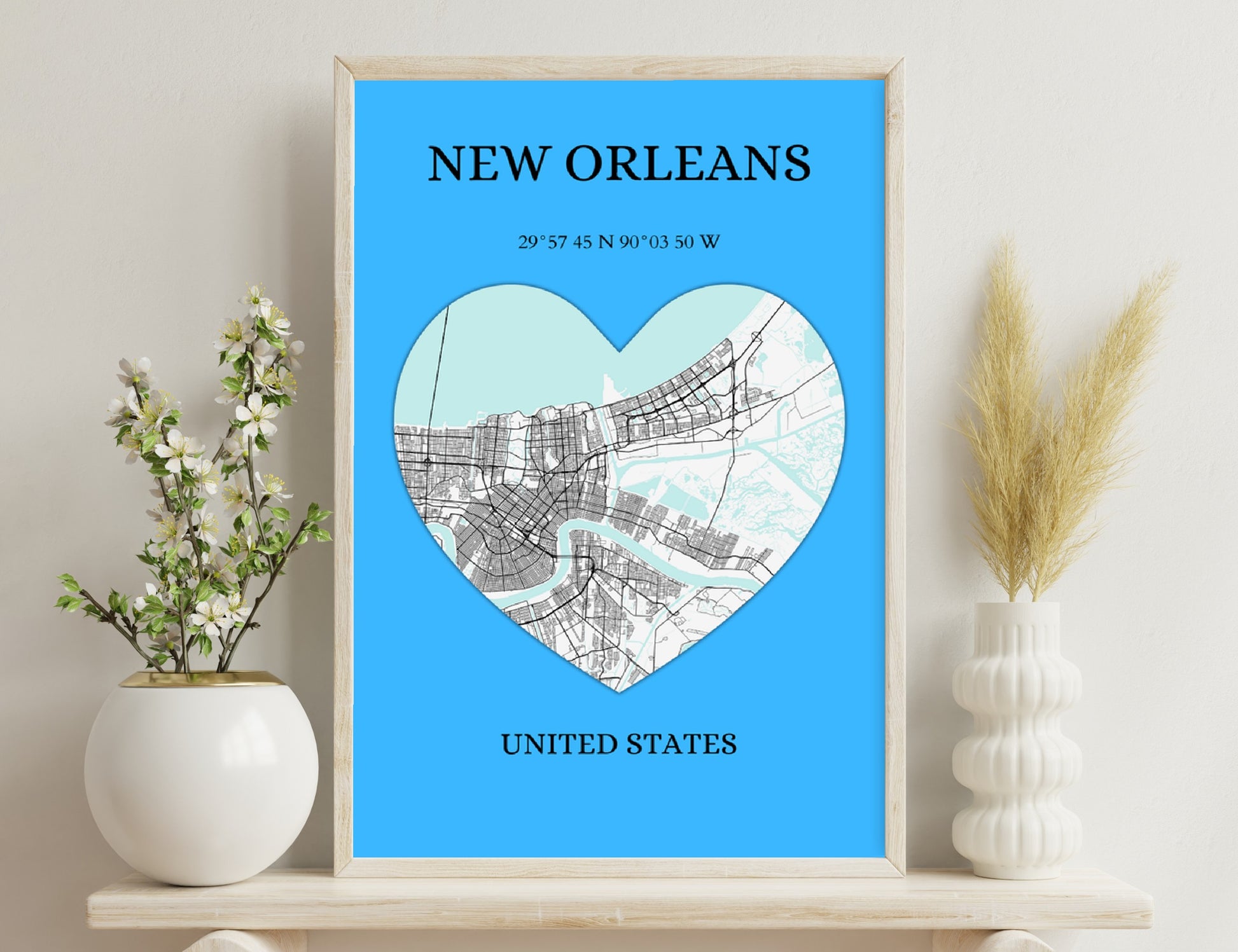 Map of New Orleans in the shape of a heart, showing the city's streets and coordinates, on a blue background with text "New Orleans, United States".
