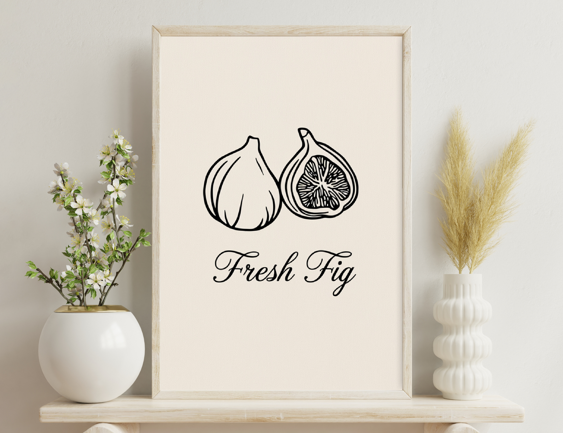 A stylized ink drawing of a whole fig and a halved fig displaying its inner seeds, with the text "Fresh Fig" below.
