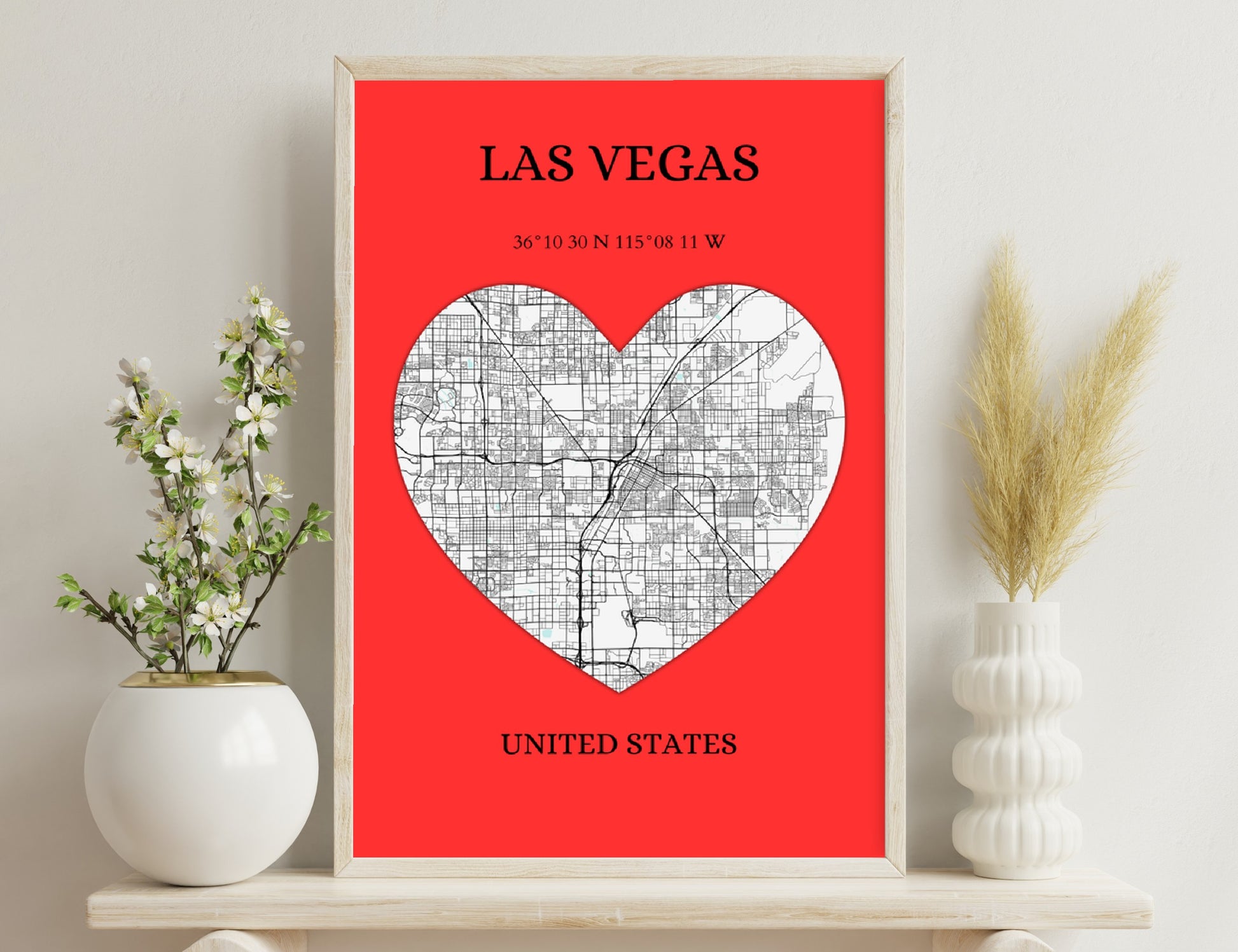 Las Vegas heart map poster with city streets overlaid on heart shape against red background, showing coordinates 36°10'30"N 115°08'11"W
