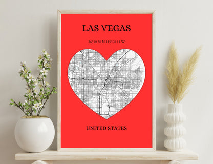 Las Vegas heart map poster with city streets overlaid on heart shape against red background, showing coordinates 36°10'30"N 115°08'11"W
