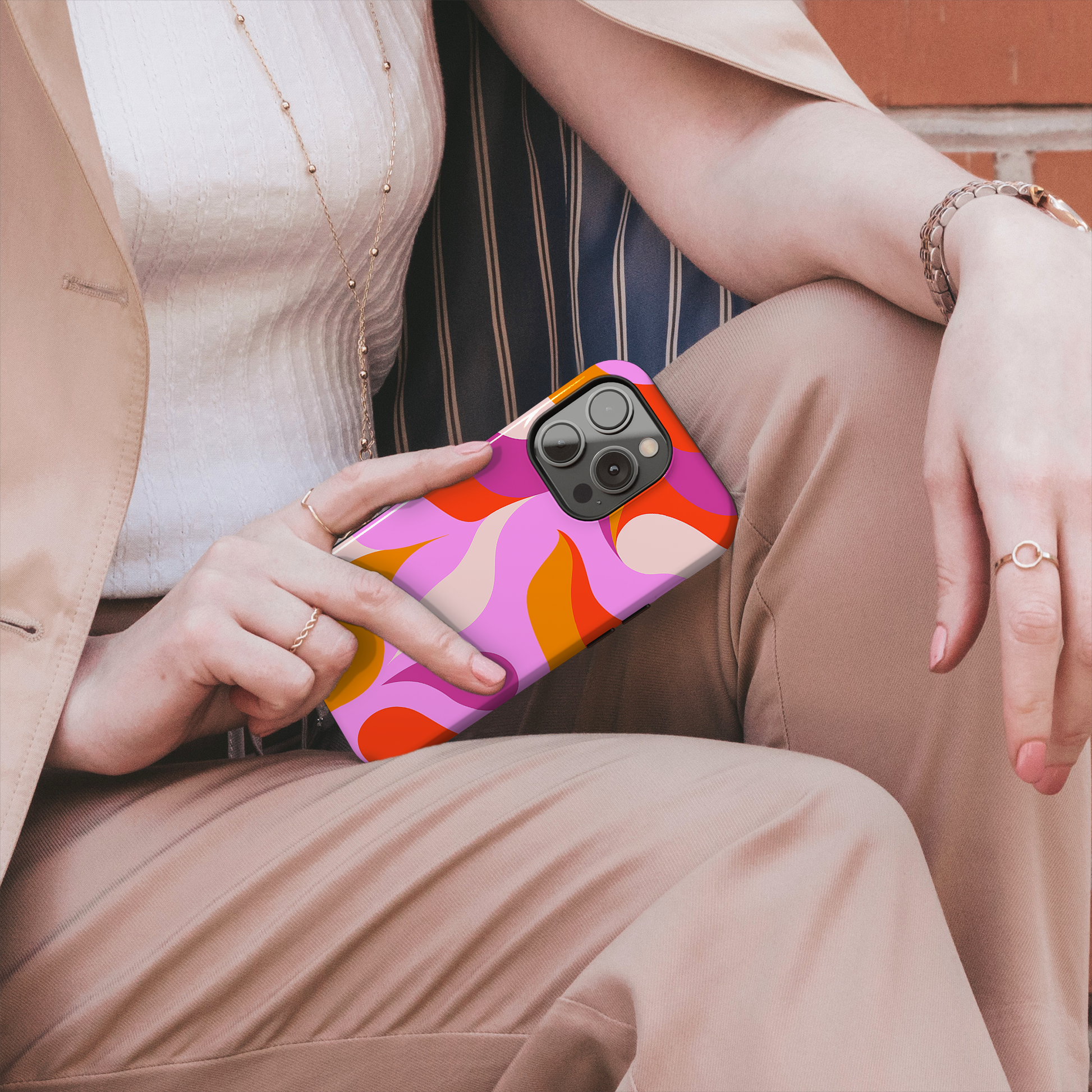 Peachy Swirls (iPhone MagSafe Case)Elevate your iPhone's protection and style with RimaGallery's Peachy Swirls design in sunset shades on a MagSafe Case against a dark backdrop. Enjoy dual-layer defenRimaGallery