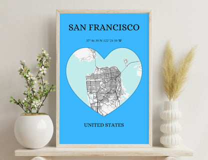 Map of San Francisco city streets in the shape of a heart over a blue background, with city's name, coordinates, and country listed below.
