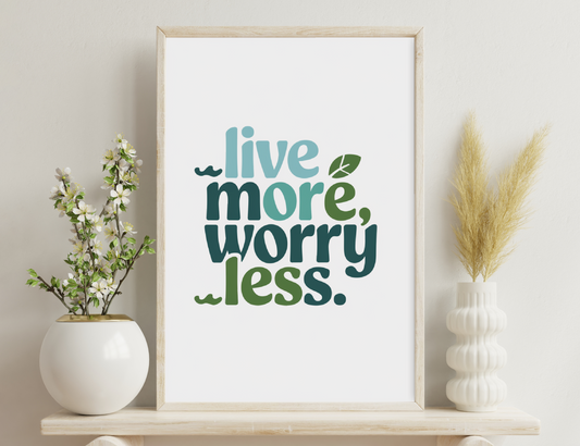 Live more, worry less. Text in green and blue shades with a leaf symbol, promoting a carefree and eco-friendly lifestyle.
