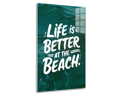 Life is better at the beach text overlaid on an image of teal ocean waves
