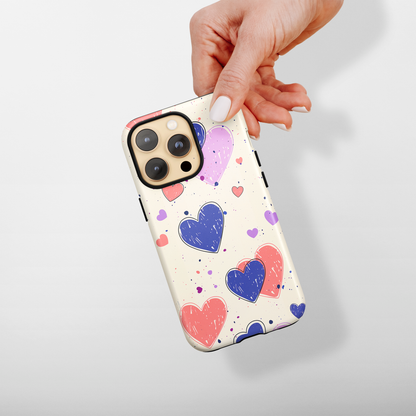 Whimsical Hearts (iPhone Case 11-15)Shop RIMA Tough Phone Case for iPhone 11-15: Ultimate protection with double-layer defense, glossy finish, and wireless charging compatibility. Urban and weather-resRimaGallery