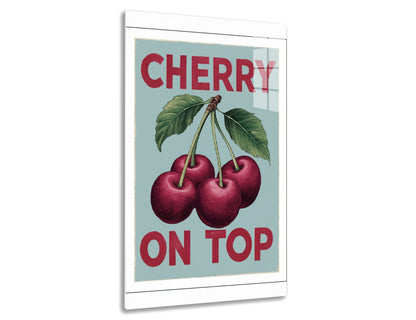 Cherry on Top poster showing three ripe red cherries with green leaves and the words "Cherry On Top" in red and blue colors.
