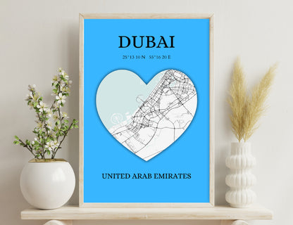 A heart-shaped map of Dubai overlaid on a blue background, with the city's name, GPS coordinates, and country "United Arab Emirates" displayed.
