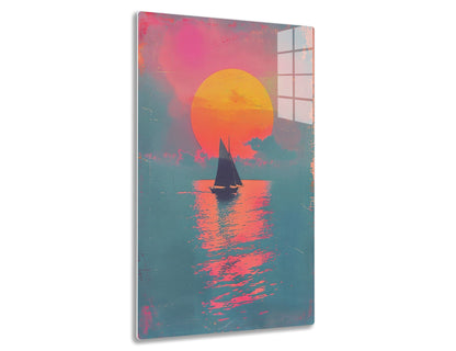 A sailboat silhouetted against a vibrant orange sunset reflecting on the water's surface, with pink and blue clouds in the sky, creating a serene and picturesque scene.
