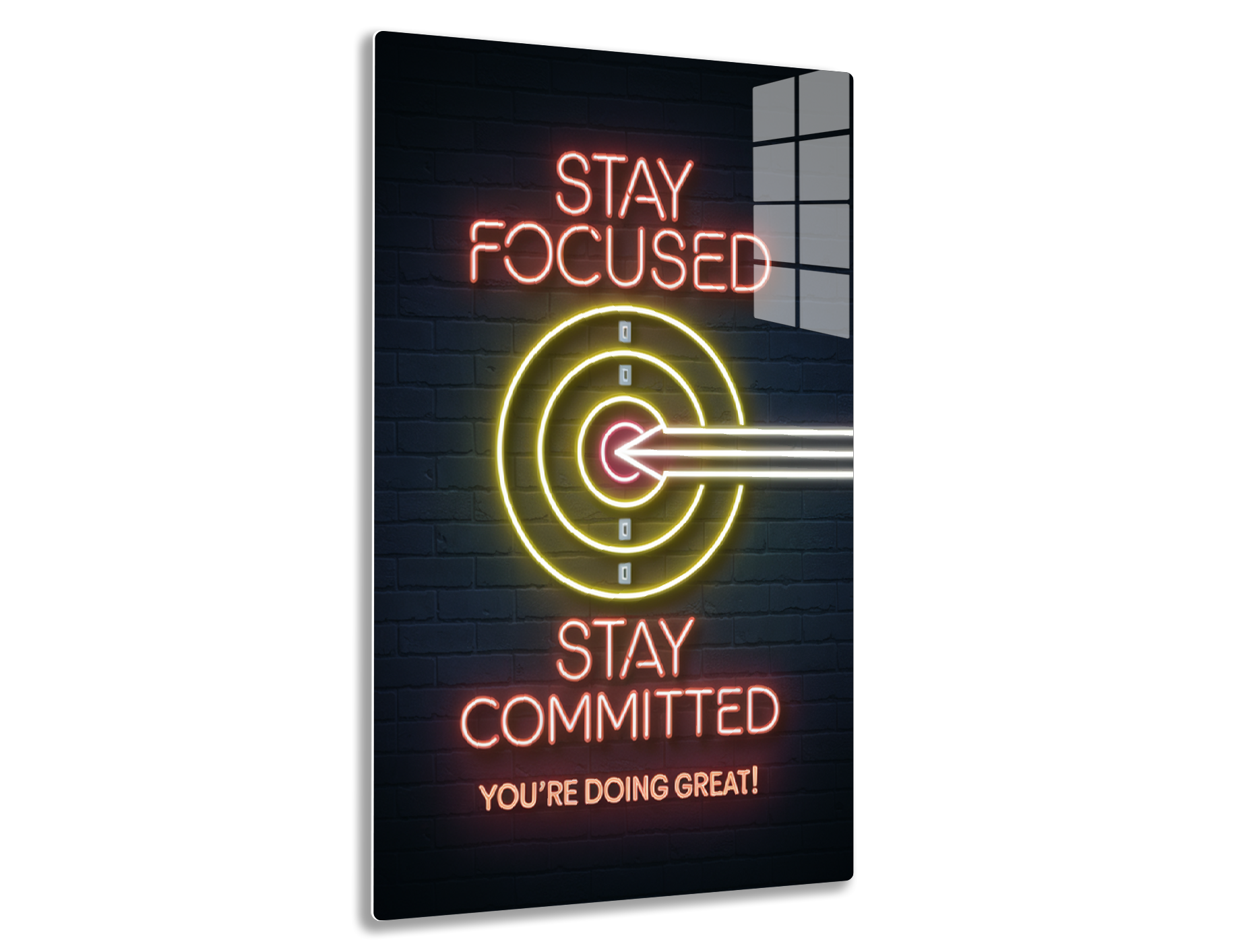 Neon sign with "Stay Focused" and target icon, along with "Stay Committed, You're Doing Great!" in motivational text and colors.
