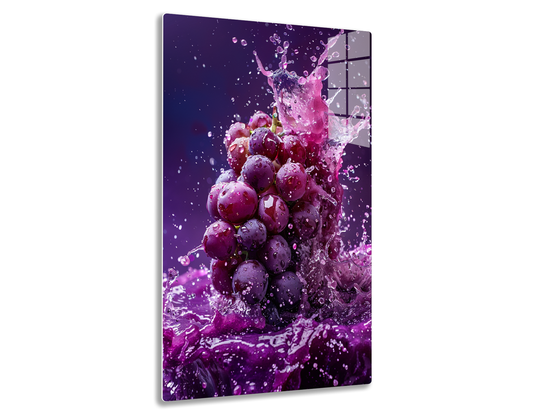 A cluster of ripe purple grapes with water droplets splashing around them, creating a vibrant and dynamic image against a purple background.

