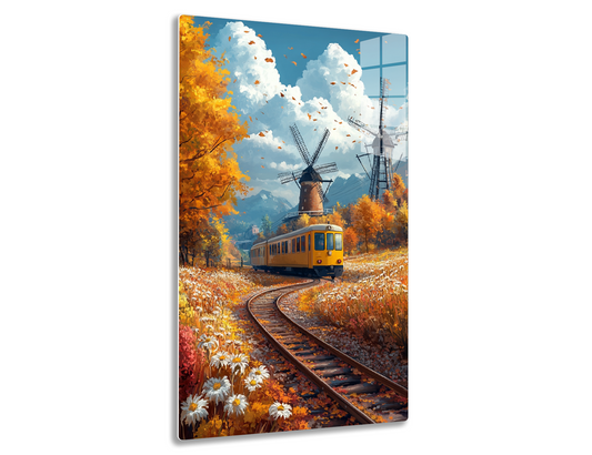 An autumn landscape with a yellow tram on train tracks, surrounded by tall windmills and golden trees with falling leaves against a cloudy blue sky and mountains in the background.
