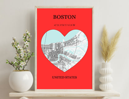 Boston city map in the shape of a heart on a red background, with the city's coordinates and location displayed below.
