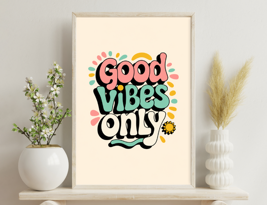 Good vibes only typography artwork with colorful splashes in pink, turquoise, yellow and black with a sun motif.
