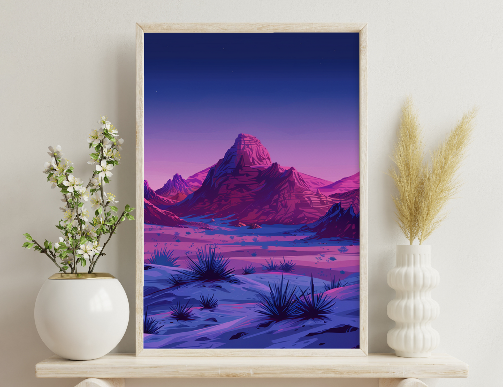 A stunning mountainous landscape at twilight, with towering snow-capped peaks glowing in vibrant pink and purple hues reflected on a serene frozen lake surrounded by yucca plants in the foreground.
