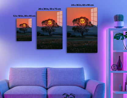 Majestic tree silhouetted against a fiery orange sunset, its branches framing the brilliant sun in a picturesque landscape with rolling hills and wildflowers in the foreground.
