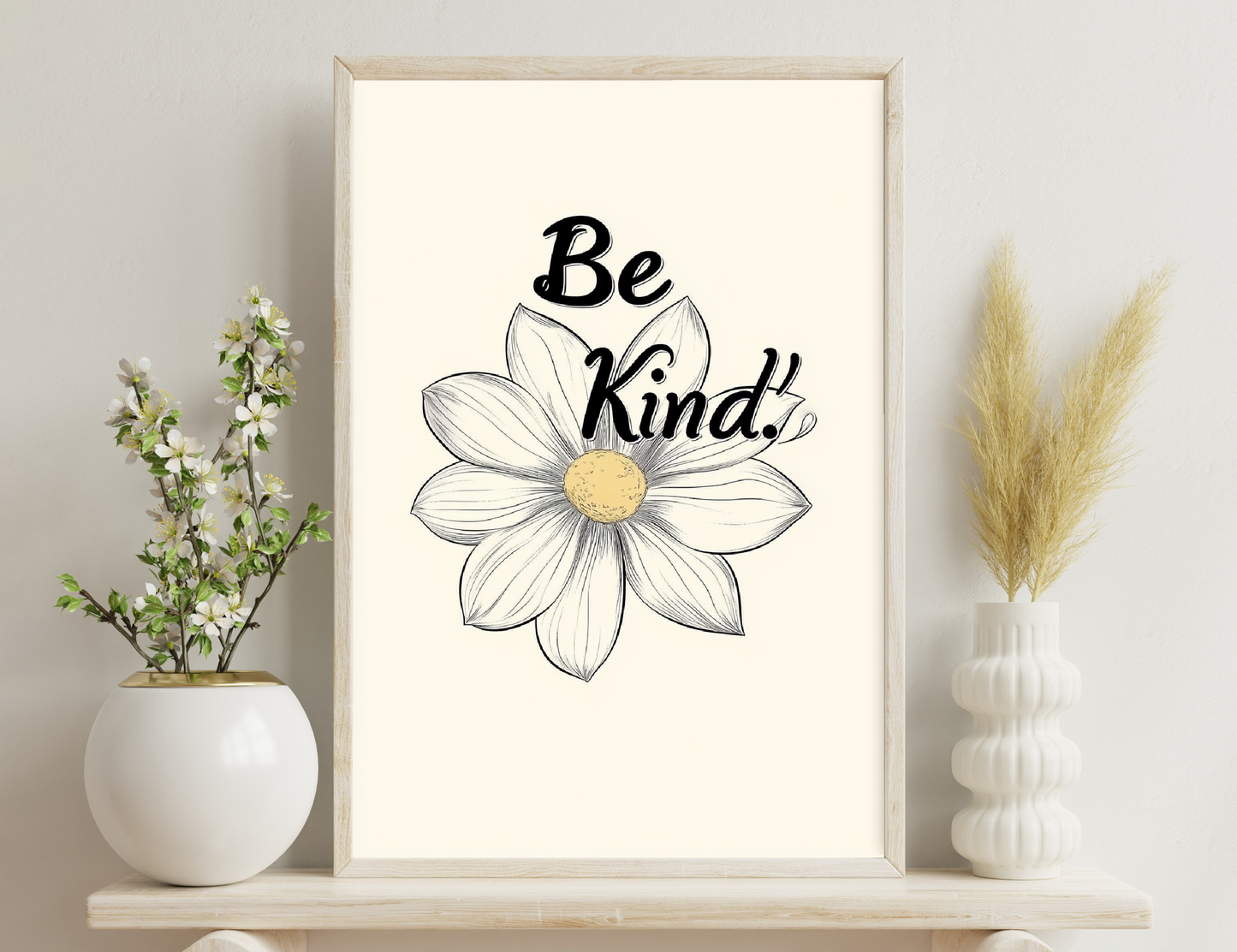 Be kind. Hand-drawn illustration of a stylized flower with the text "Be kind." in calligraphic script inside the petals, promoting kindness as a positive message.
